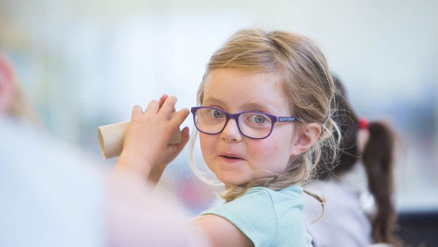 Little girl enjoying arts and crafts