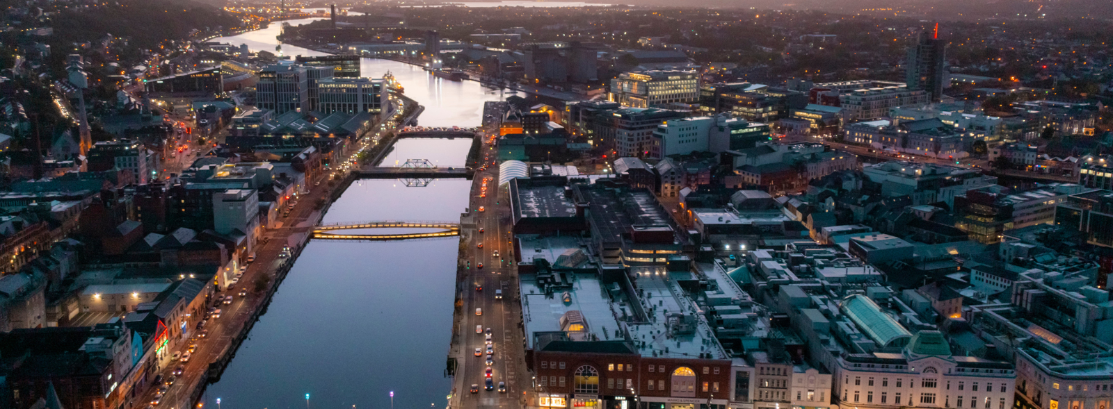 Aerial view of city at dusk