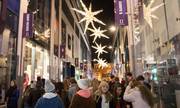 Young-people-gathered-under-Christmas-Lights_opt_GalleryB