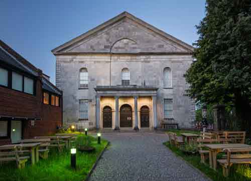 Image of Triskel Christchurch with lit portico. Credit: Jed Niezgoda