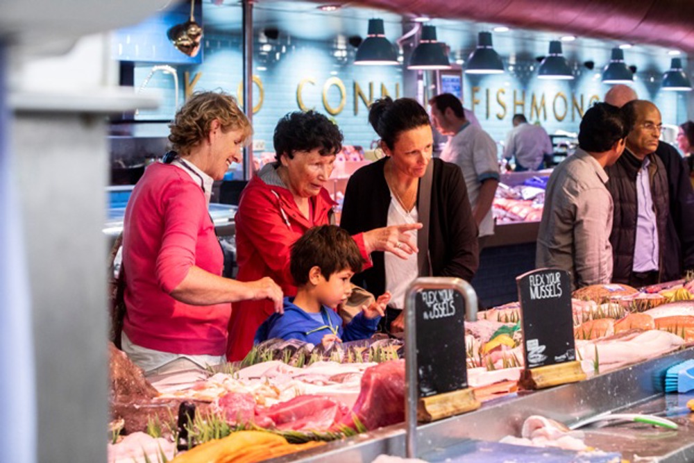 Customers queuing to order meat