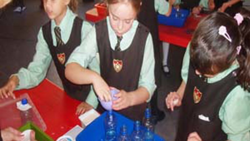 Children participating in science experiment