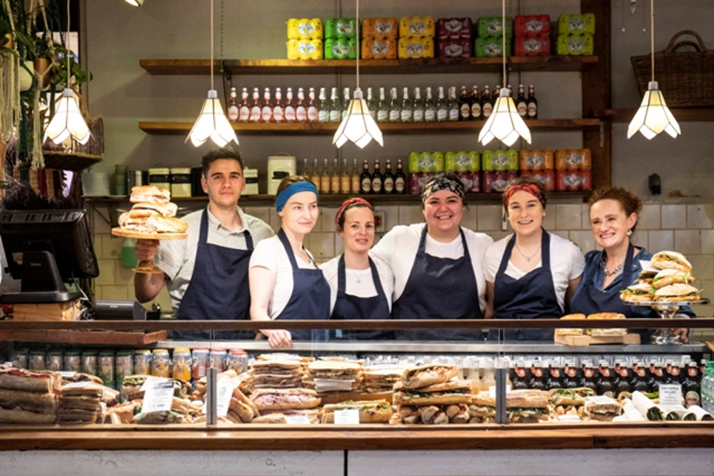 Staff photo of the Sandwich stall employees