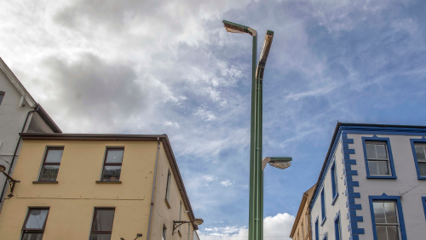 Image of three lamp poles