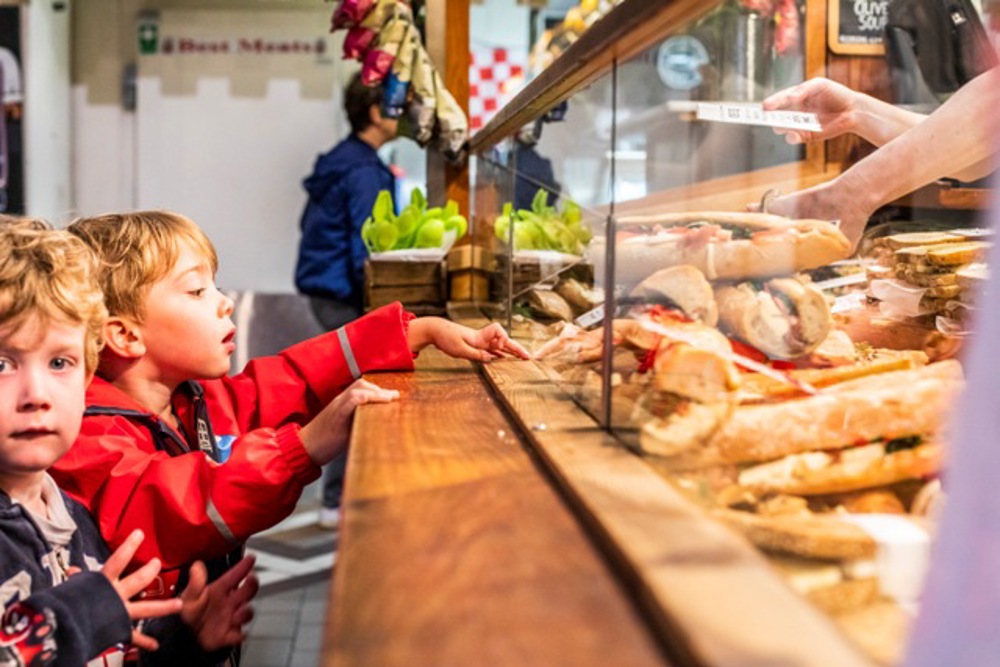 Children looking at sandwich display